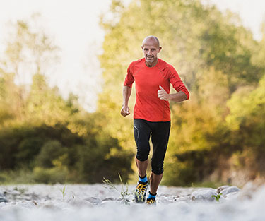 Strong man doing workout outdoor